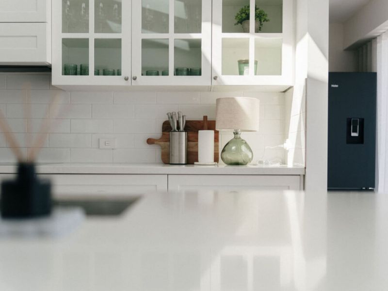 Spacious kitchen with generous bench space for meal preparation.