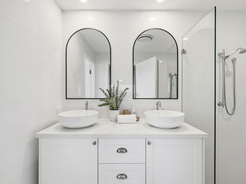 Double vanity ensuite with modern finishes.