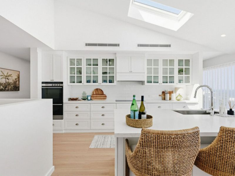 Stylish kitchen with island seating for family meals.