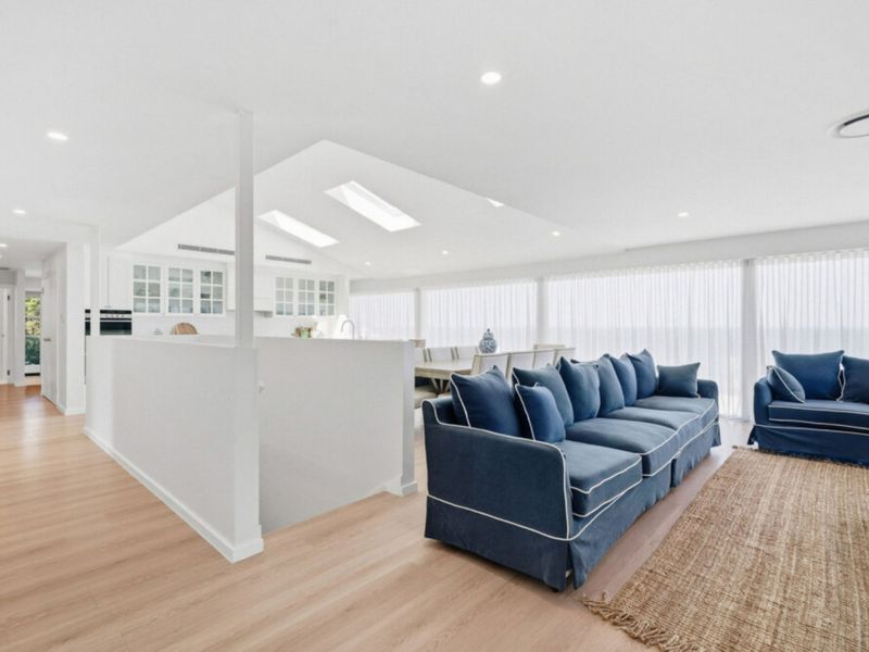 Sink into plush seating and enjoy the relaxed coastal ambiance.