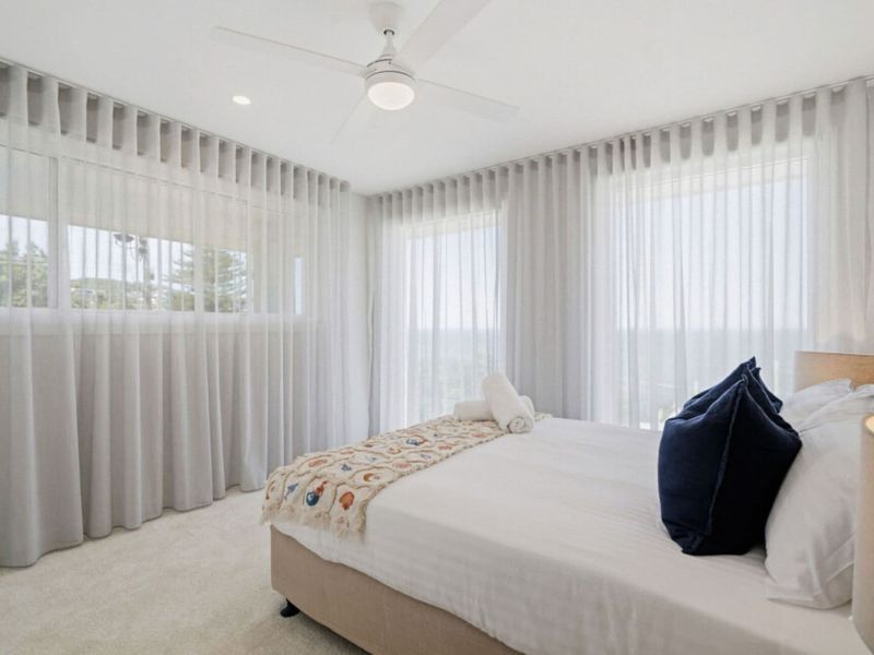 Wake up to beautiful natural light in this queen bed