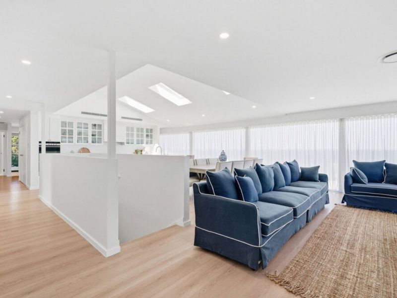 Seamless flow between the kitchen and living areas.