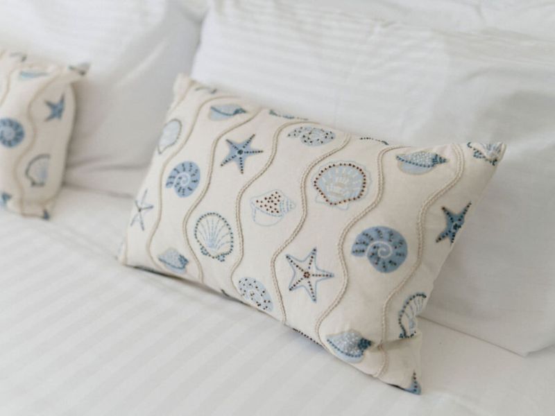 Beach-themed décor creates a welcoming coastal atmosphere.