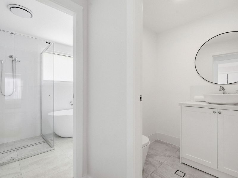 Unwind in crisp, spa-like luxury—your private minimalist oasis awaits.