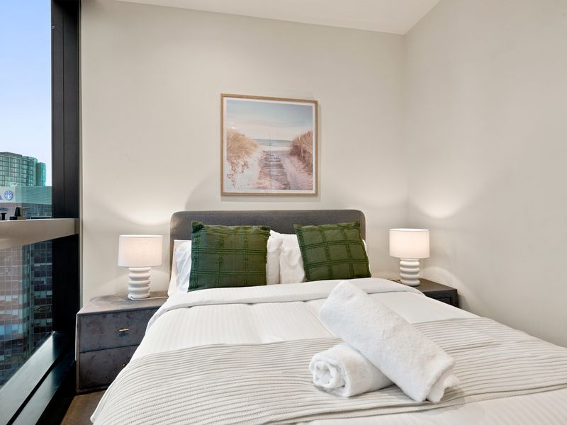 Chic guest bedroom designed for restful city stays.