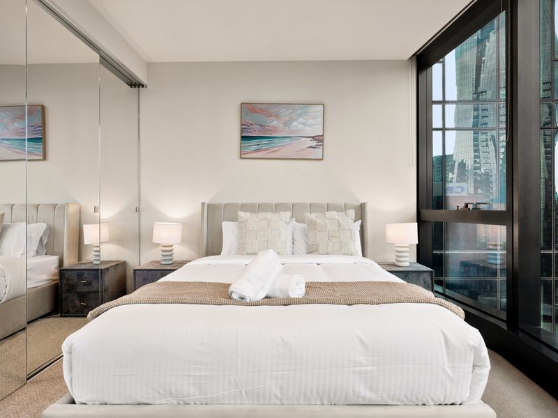 Spacious bedroom retreat blending comfort and contemporary style.