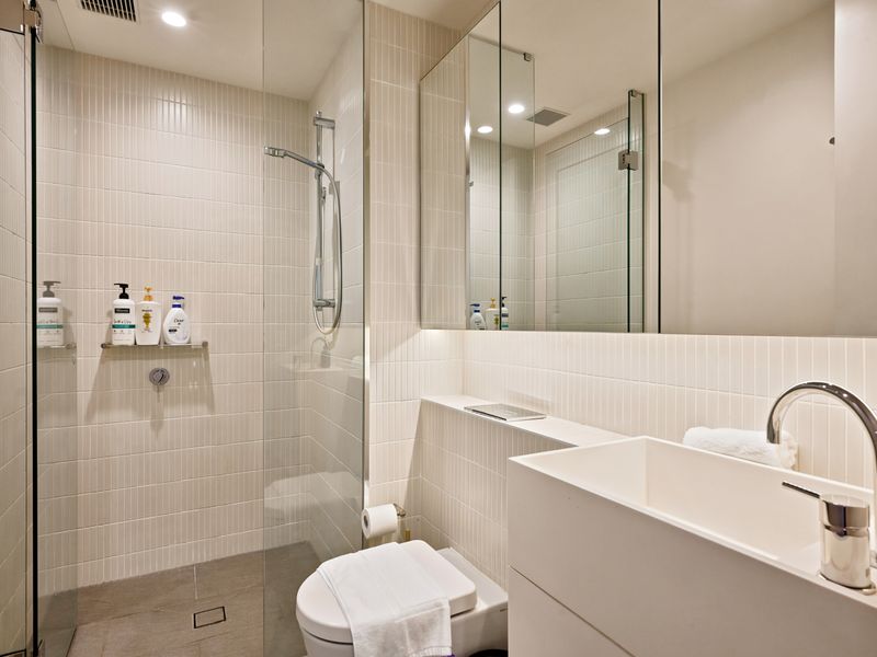 Spa-inspired bathroom with modern fittings and calming tones.