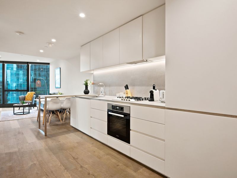 Stylish gourmet kitchen with seamless open-plan living.