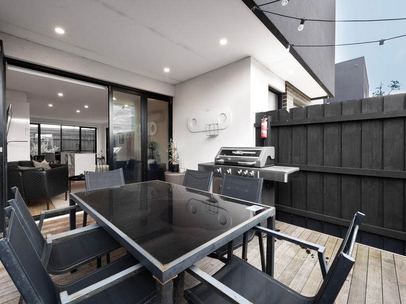 The private courtyard offers the perfect spot for relaxed outdoor meals and evening drinks.