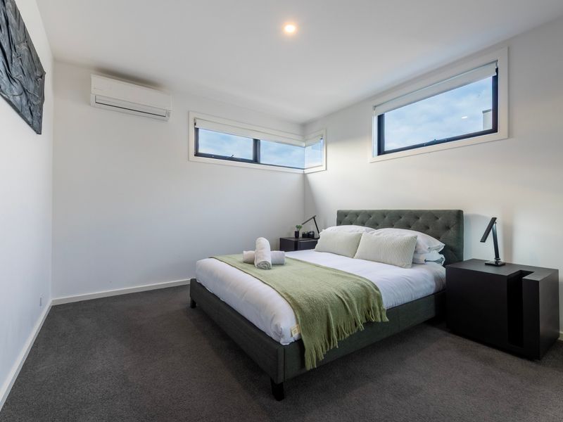 Rest easy in the comfortable master bedroom with soft linens and air conditioning