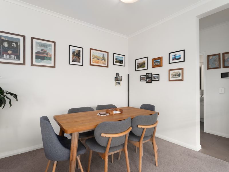 Share meals and create memories around the dining table in this inviting open-plan space.