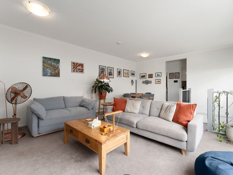 Gather with family and friends in the welcoming lounge, featuring comfortable seating and plenty of natural light.