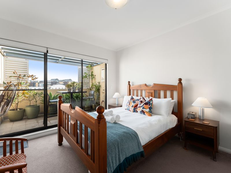 A comfortable guest bedroom provides a quiet space for restful nights.