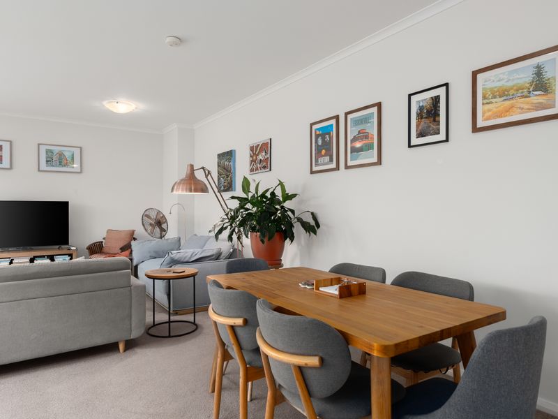 The dining and living areas flow effortlessly together, creating the perfect place to connect.