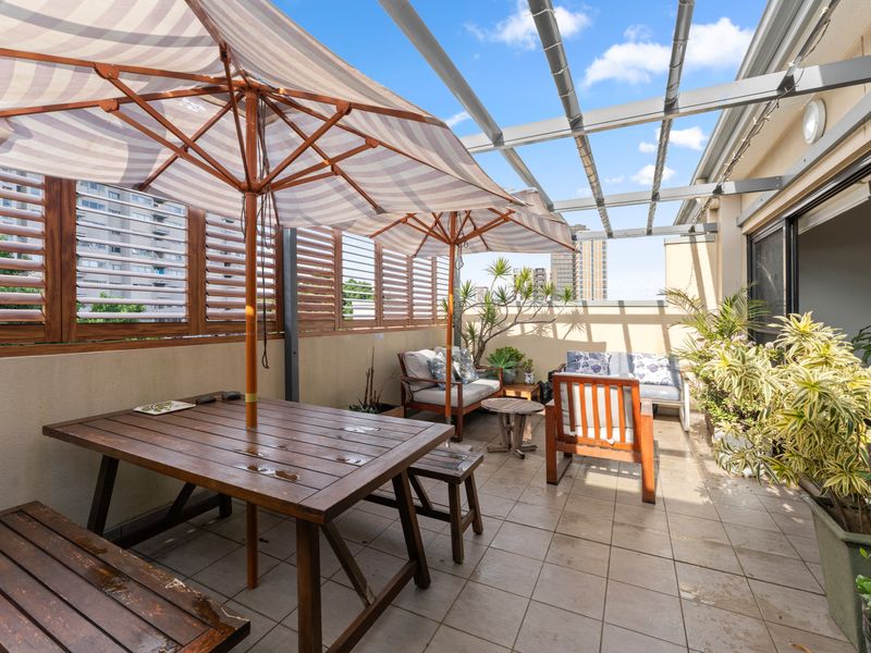 The spacious outdoor entertaining area is perfect for long lunches, evening drinks, or family gatherings.