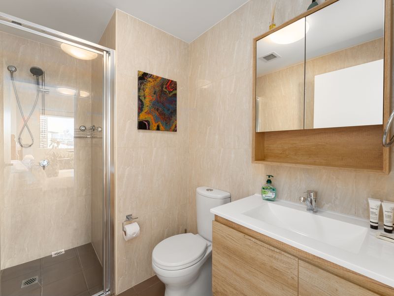 Freshen up in the bright bathroom complete with ample vanity space