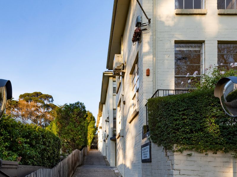 The well-maintained apartment building combines classic character with modern convenience.