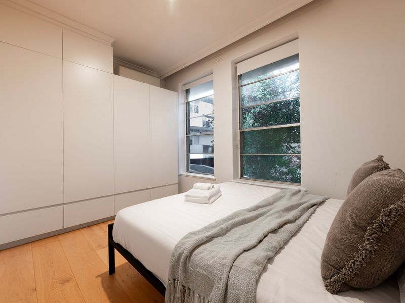 Built-in wardrobes offer generous storage for longer stays.