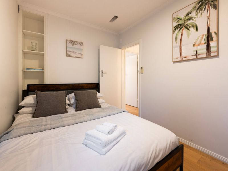 A comfortable guest room provides a quiet space to relax and recharge.