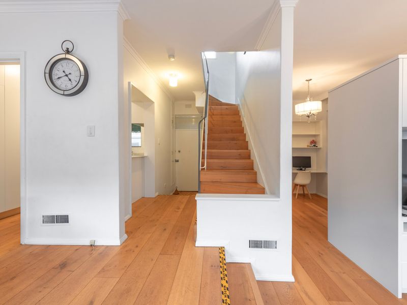 The central hallway connects each space with an open and airy feel.
