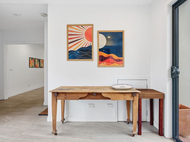 Step inside to a welcoming entryway with stylish décor that instantly feels like home.