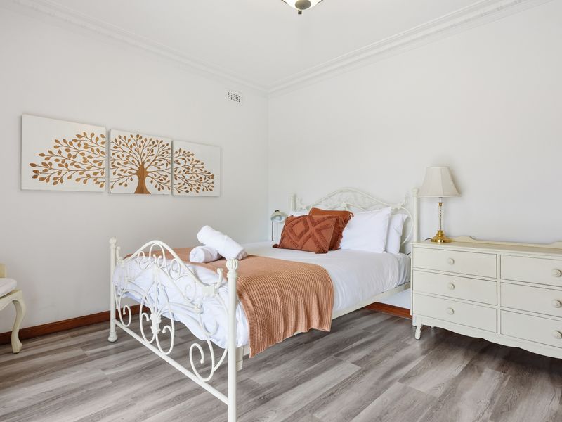 Downstairs Bedroom 1 - A beautifully styled bedroom offers a peaceful sanctuary for restful evenings