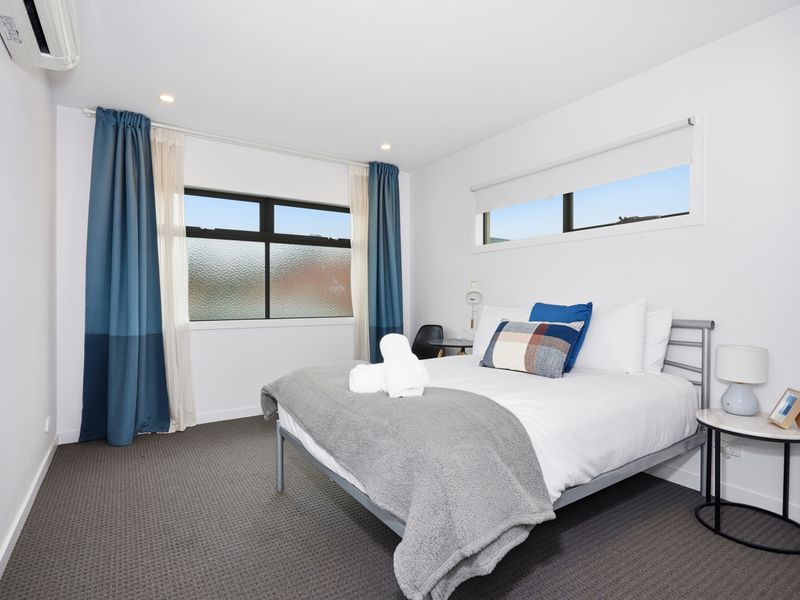 Upstairs bedroom 5 - Relax in another bright bedroom designed for restful nights and lazy mornings.