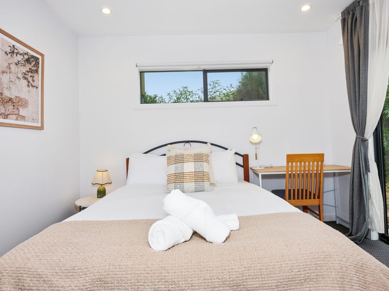 Downstairs bedroom 4 - A bright and comfortable guest bedroom provides a restful retreat after a day of exploring.