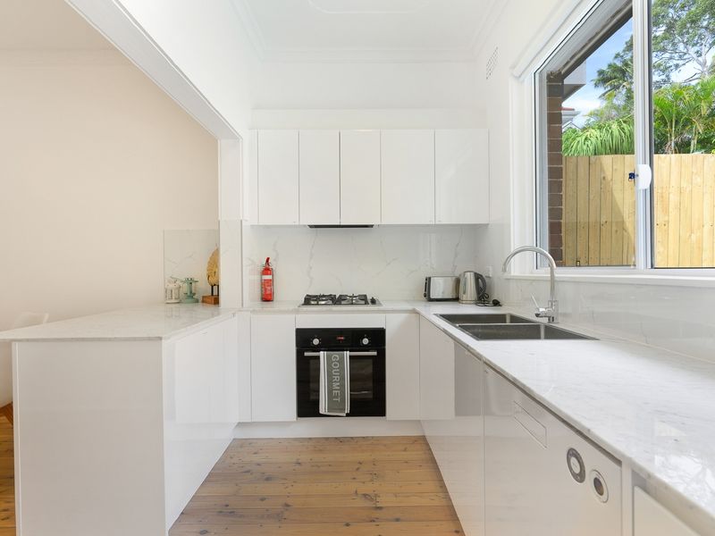 Fully equipped kitchen with quality appliances and plenty of bench space.