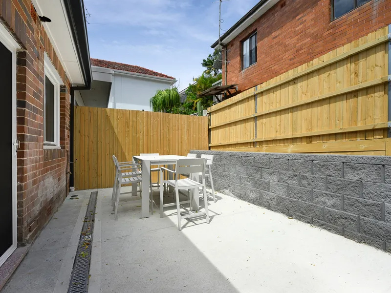 Enjoy your own private outdoor courtyard for dining or unwinding.