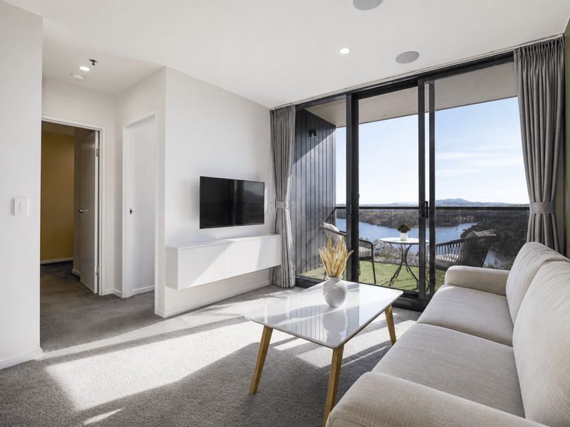 Floor-to-ceiling windows frame sweeping views from the lounge.