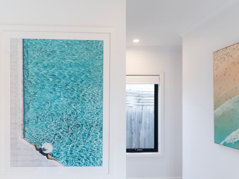 Bright hallways and thoughtfully designed interiors create a welcoming atmosphere throughout the home.