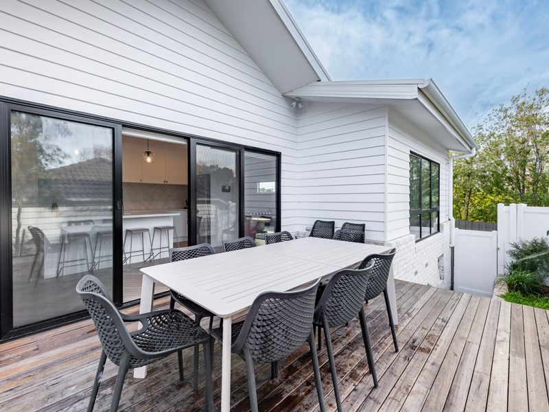 Gather around the outdoor table for alfresco meals in your own private entertaining space.