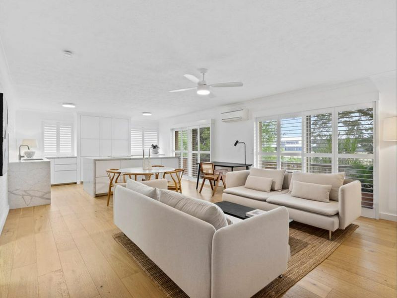The open-plan living, dining, and kitchen area creates a welcoming space to relax and reconnect.