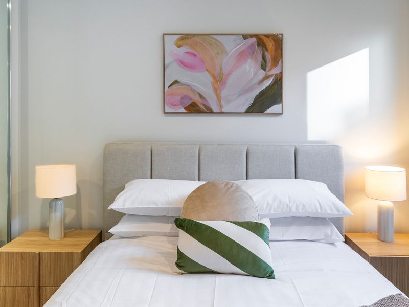 Wake each morning in a bright room filled with calming tones and natural light.
