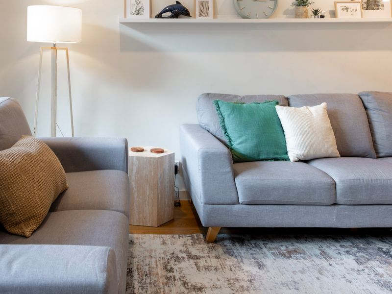 Plush seating and tasteful décor make this the perfect spot to put your feet up.