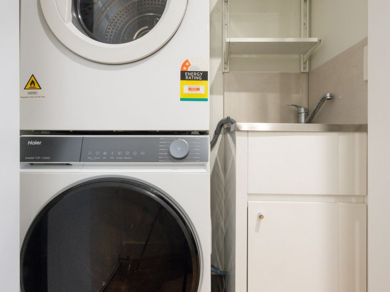 A dedicated laundry with washer and dryer makes longer stays effortless.