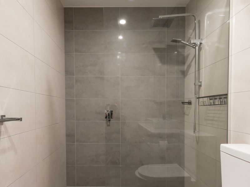 The spacious shower offers a refreshing start to every day.