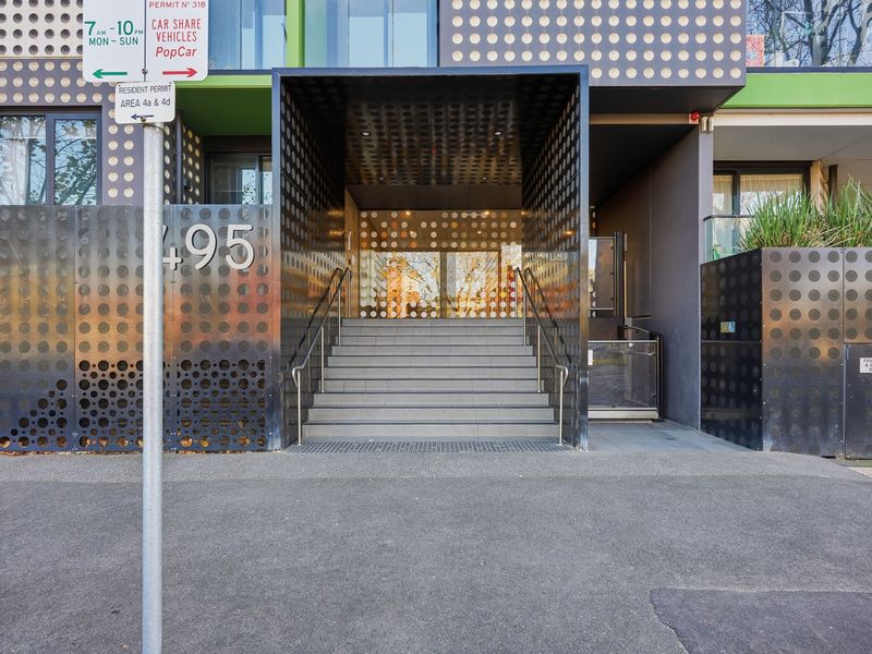 The impressive building entrance combines modern design with convenient secure access.