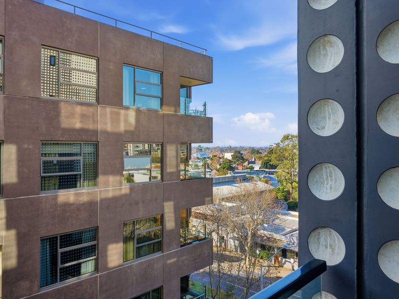 Enjoy glimpses of the surrounding neighbourhood from your elevated apartment setting.