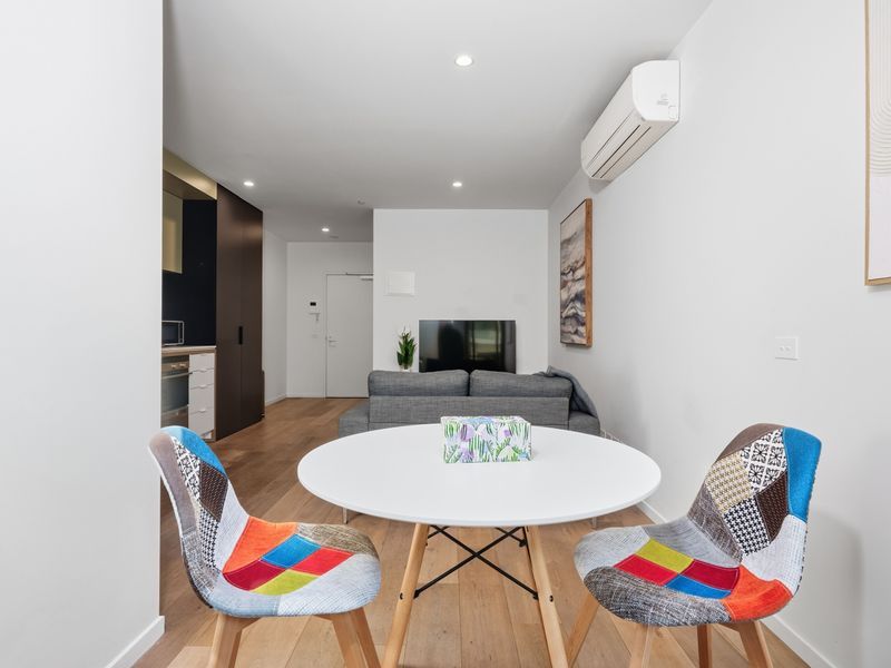 Share breakfast, coffee, or a casual meal around the cheerful dining table.