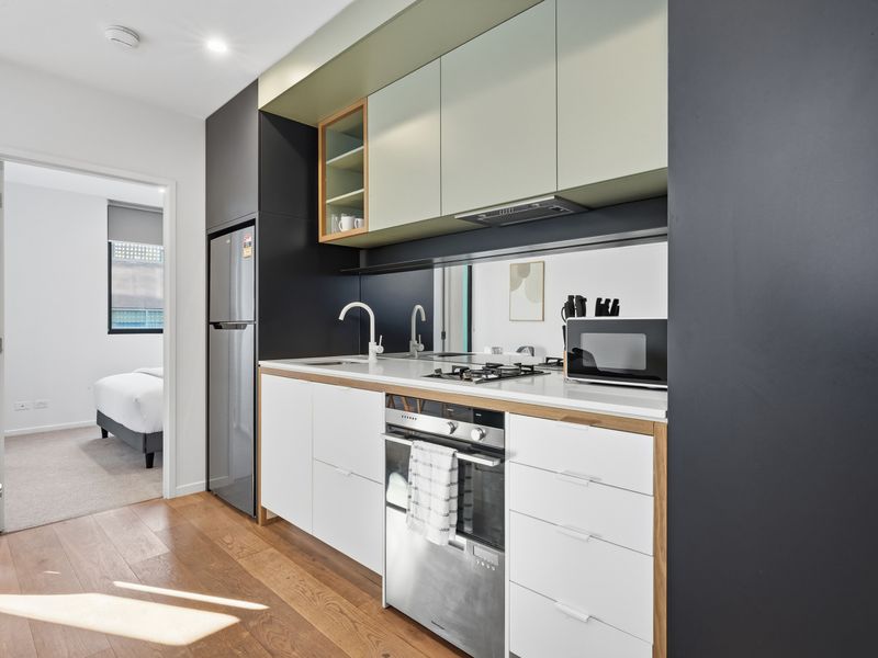 A contemporary kitchen equipped with modern appliances makes every meal effortless.