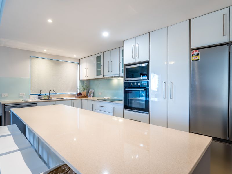 Large stone benchtop with plenty of space for meal preparation.