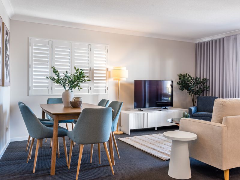 Another view of the spacious open-plan living and dining space.