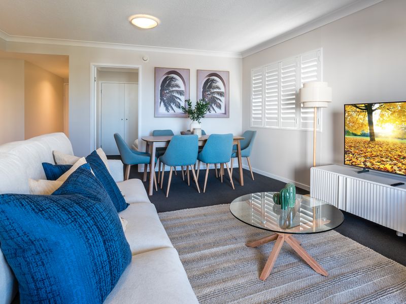 Relax in the stylish lounge with comfortable seating and TV.