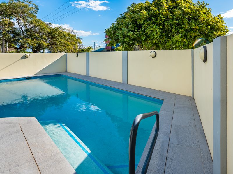 Take a refreshing dip in the shared outdoor pool.
