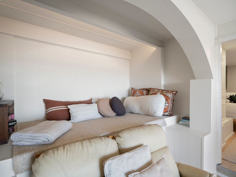 A built-in daybed offers the perfect spot to curl up with a book or enjoy a quiet moment.