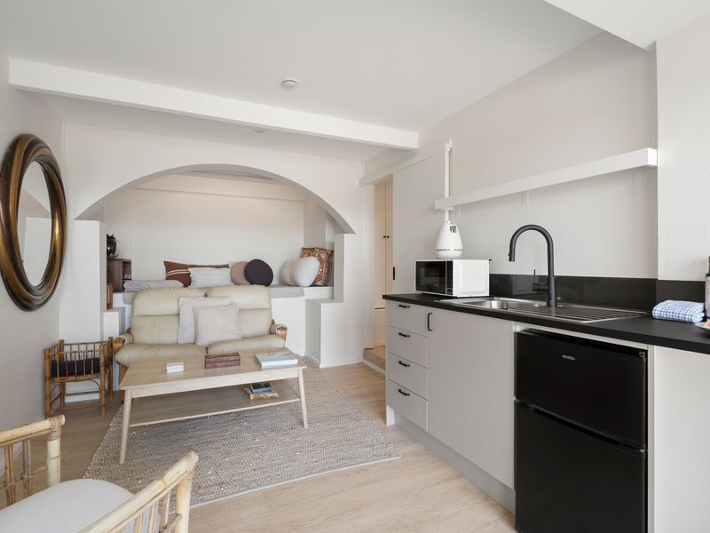 Enjoy the convenience of a compact kitchen without compromising on style.
