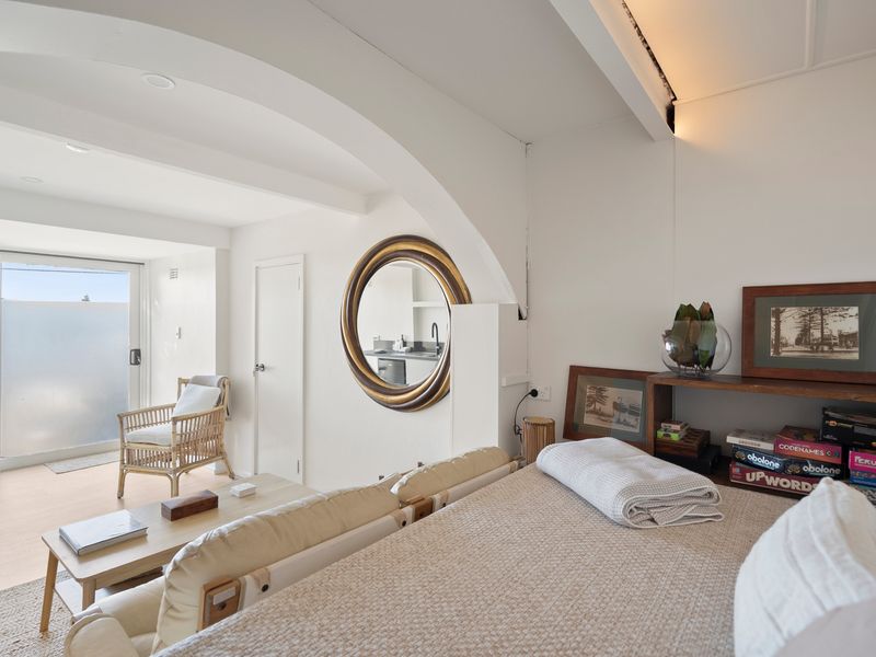 Relax in the inviting lounge where soft natural light fills the space.
