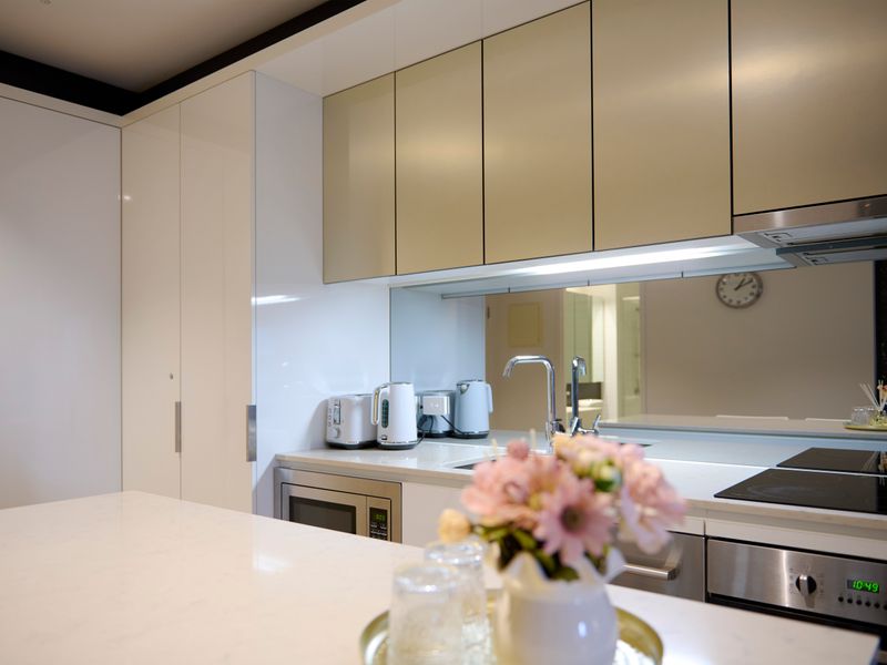 The beautifully designed kitchen combines practicality with contemporary style.